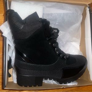 Never worn black combat boots